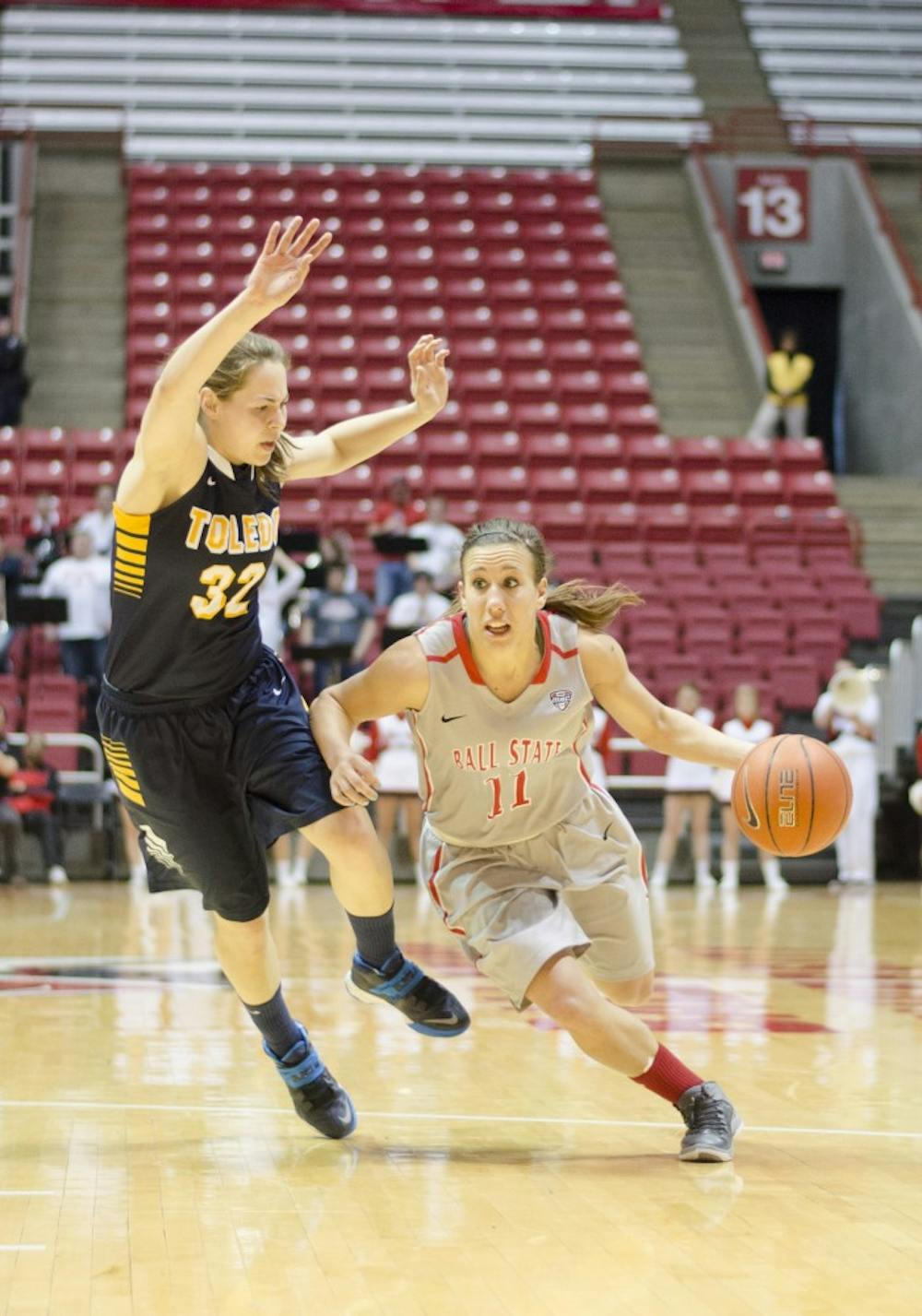 Senior guard Brandy Woody drives the ball past a Toledo player in the second half March 8 at Worthen Arena. Woody scored 11 points in the game. DN PHOTO BREANNA DAUGHERTY 