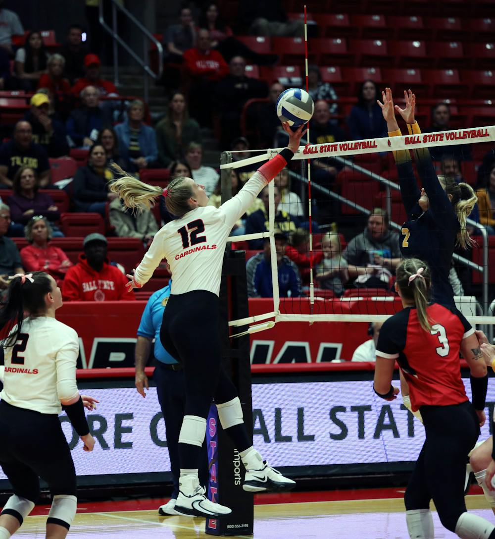 Senior outside hitter Cait Snyder tips the ball over the net against Toledo Oct. 17 at Worthen Arena. Snyder scored one point in the game. Mya Cataline, DN