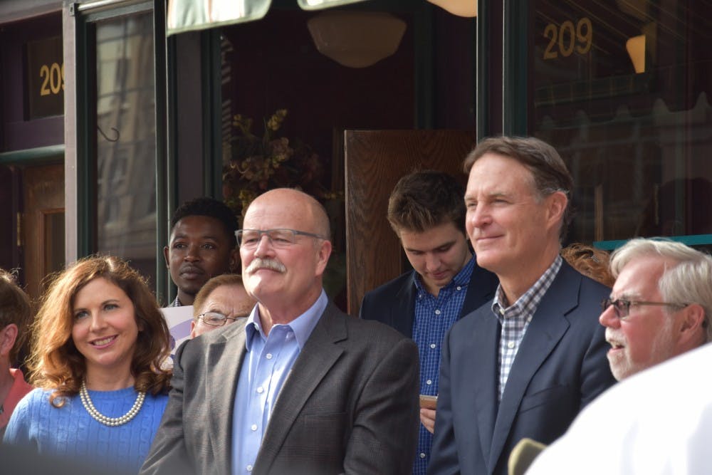 (From left) Democratic politicians Christina Hale, John Gregg and Evan Bayh came to speak about issues in Indiana in front of Vera Mae's Bistro in downtown Muncie on Nov. 2. The candidates&nbsp;running for state and national offices spoke about Delaware County, the city of Muncie and Ball State students.&nbsp;Patrick Calvert // DN&nbsp;