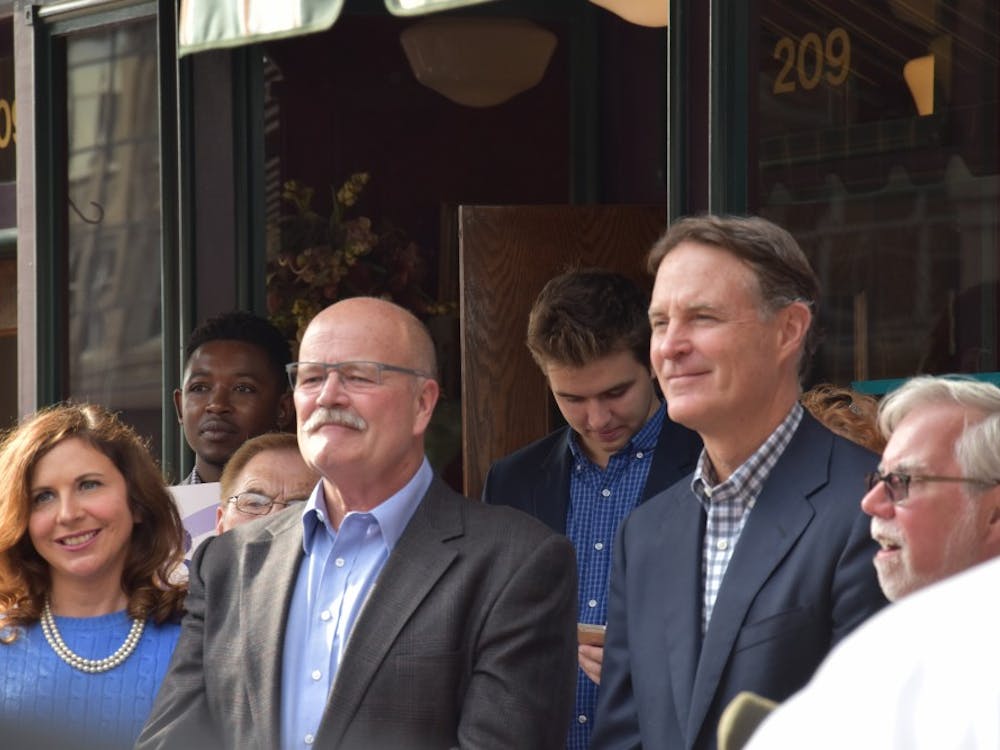 (From left) Democratic politicians Christina Hale, John Gregg and Evan Bayh came to speak about issues in Indiana in front of Vera Mae's Bistro in downtown Muncie on Nov. 2. The candidates&nbsp;running for state and national offices spoke about Delaware County, the city of Muncie and Ball State students.&nbsp;Patrick Calvert // DN&nbsp;