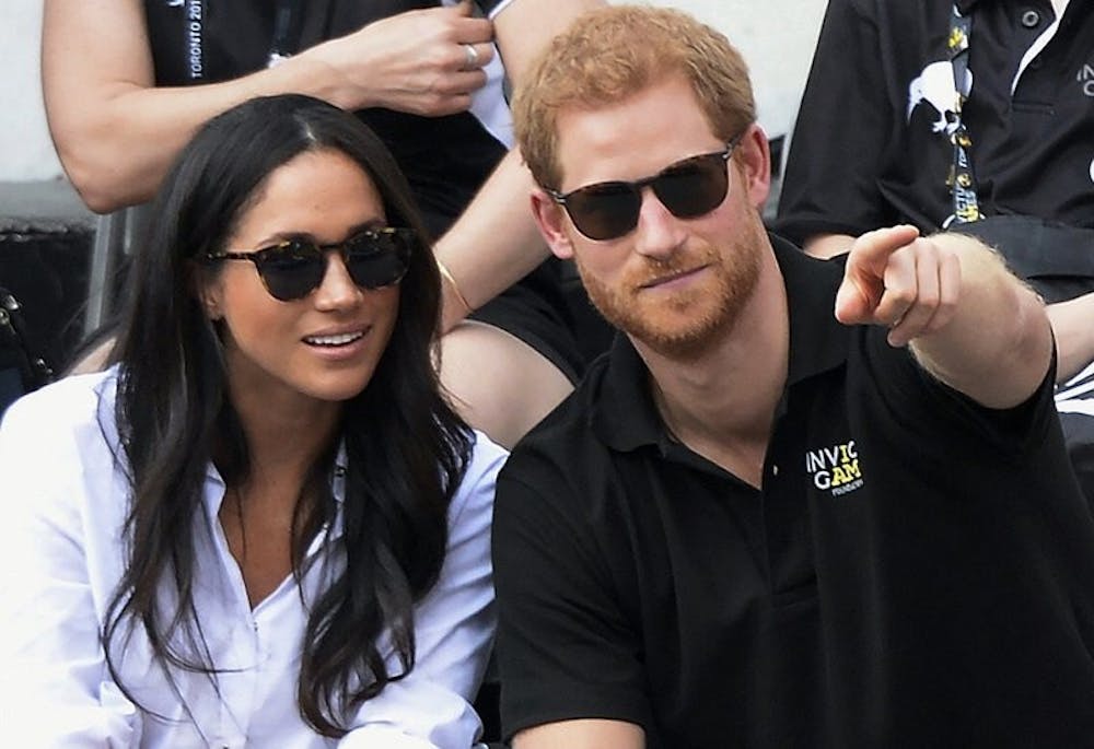 <p>In this Monday, Sept. 25, 2017 file photo, Britain's Prince Harry and his girlfriend Meghan Markle attend the wheelchair tennis competition during the Invictus Games in Toronto. Palace officials announced Monday Nov. 26, 2017, Prince Harry and Meghan Markle are engaged, and will marry in the spring. <strong>Associated Press</strong></p>
