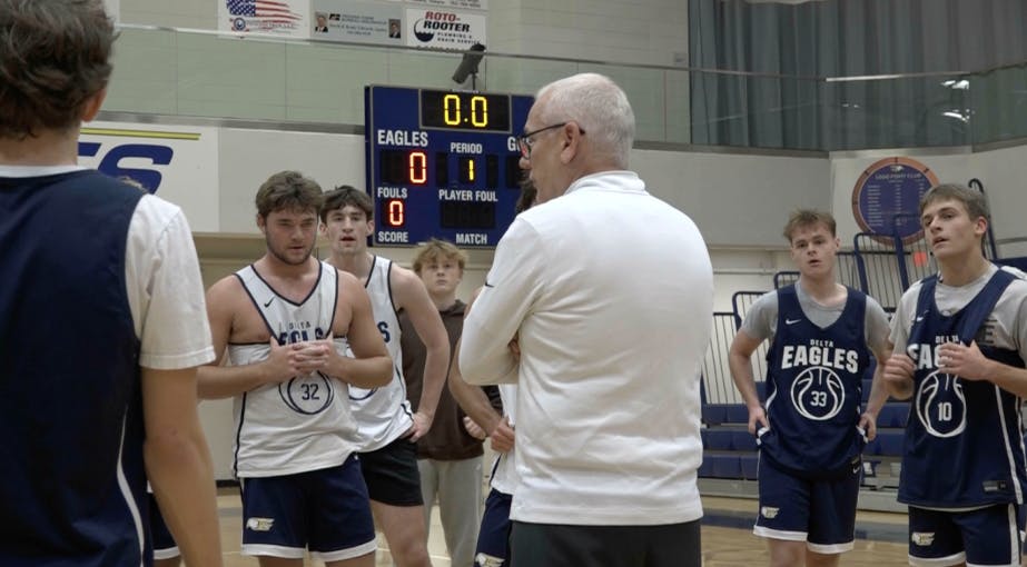 Head Coach, Mark Detweiler rallies his squad after practice.
