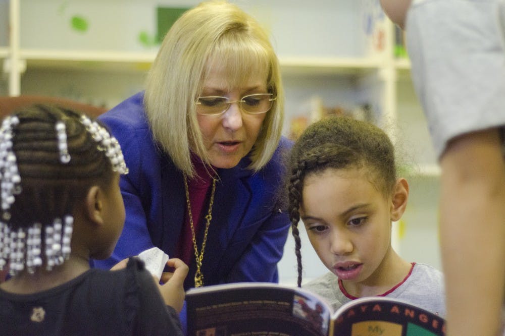 Grace Ferguson, the wife of Ball State's president Paul Ferguson, talks to Rehyanna, a member of the reading's 5-7 age group, at the Boys and Girls Club of Muncie. Grace Ferguson was a volunteer on Jan. 19 at the "I Read