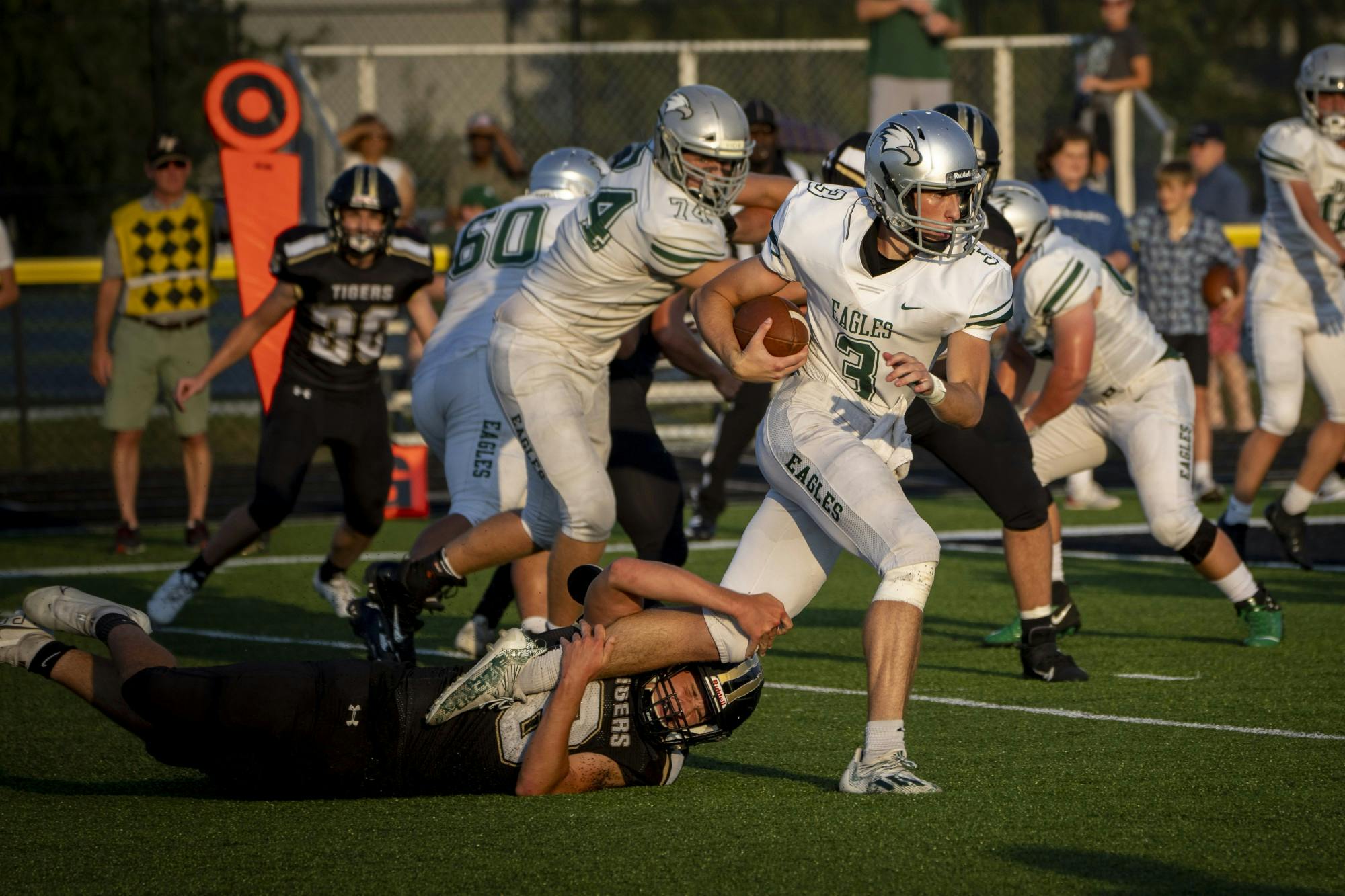 Fourth-year quarterback Christian Abney runs with the football in a game against Lebanon Aug. 27, 2021, at the Zionsville Football Stadium in Zionsville, Ind. Tom Marron, Photo Provided