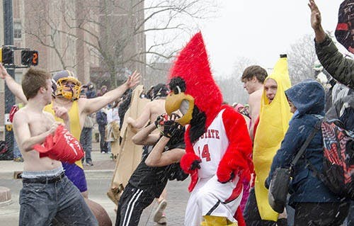 Participants dance in the middle of the Scramble Light on Feb. 13, 2013. The students recreated a popular viral video. DN PHOTO COREY OHLENKAMP