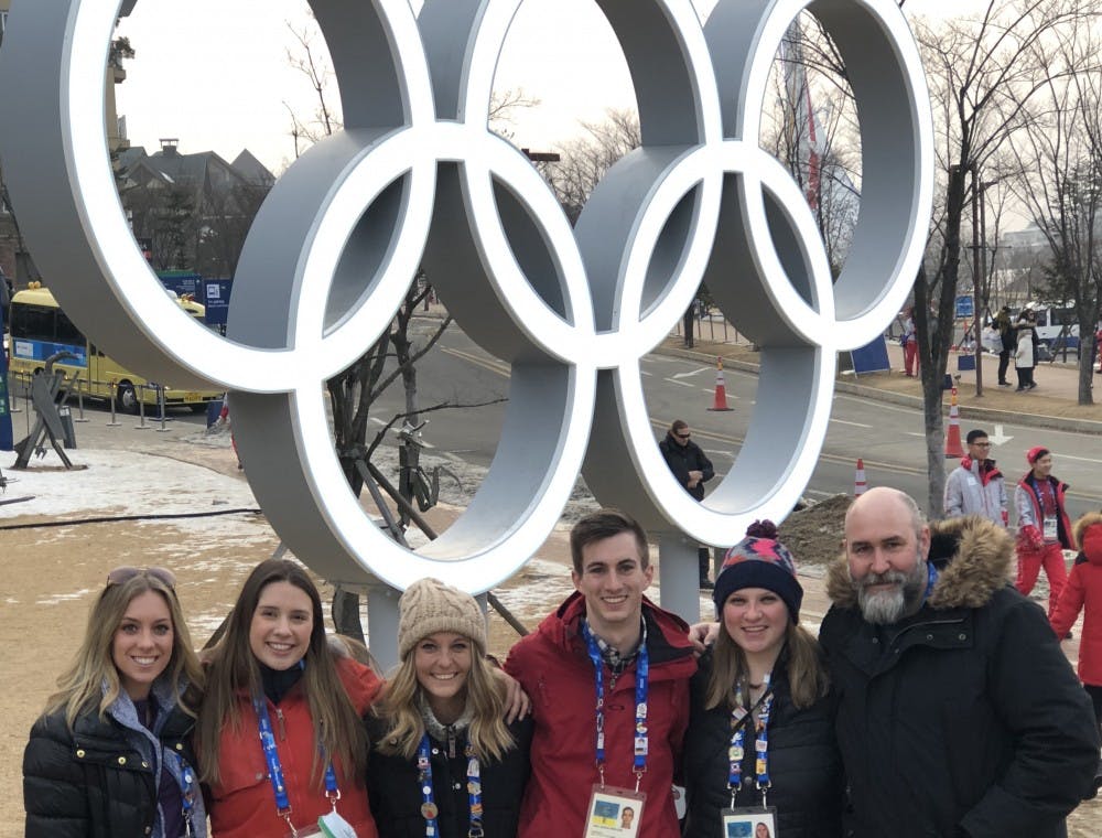 The BSU at the Games team stands in front of the Olympic rings outside of the media center after a day of reporting. Ryan Sparrow, Photo Provided