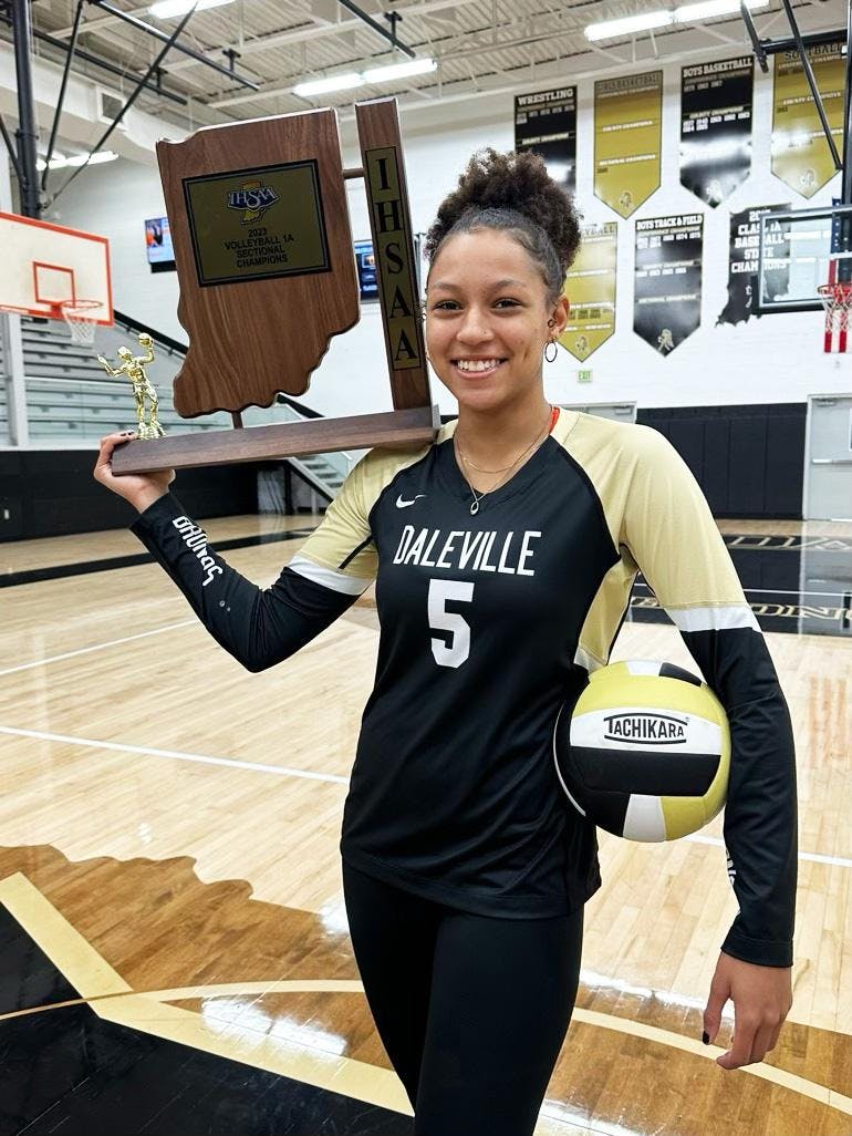 Daleville junior Trishell Johnson poses with the sectional championship trophy Oct. 14 at Daleville High School. Photo provided by Daleville volleyball. 