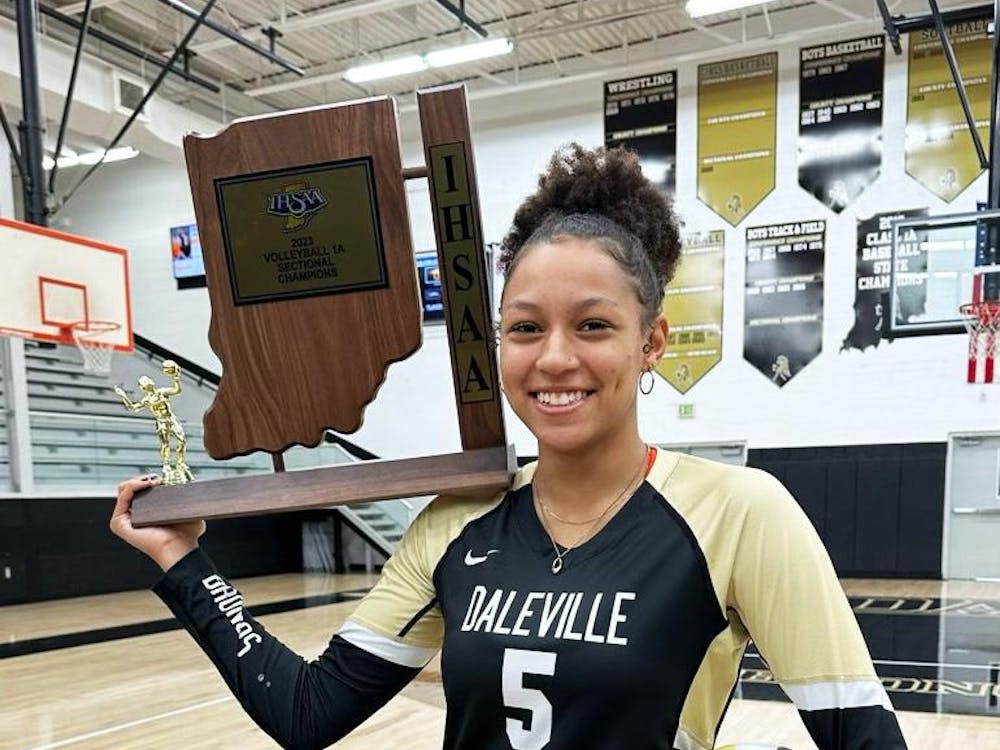 Daleville junior Trishell Johnson poses with the sectional championship trophy Oct. 14 at Daleville High School. Photo provided by Daleville volleyball. 