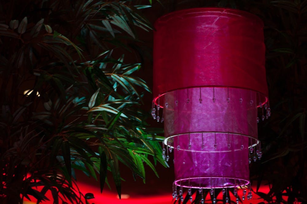 Lights were placed around the entrance to the Asia section of The Amazing Taste. DN PHOTO JASON CONERLY