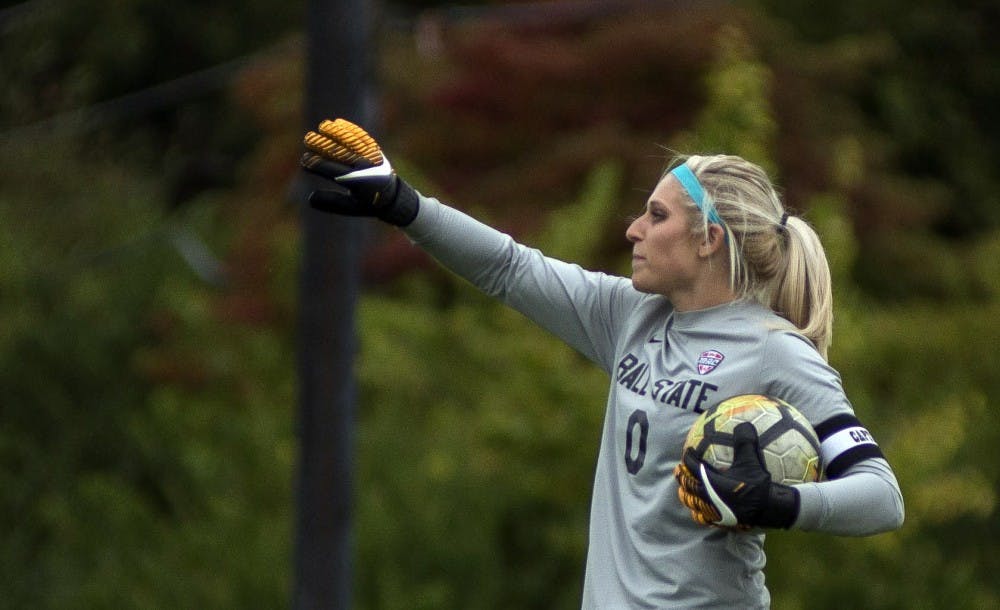 <p>Senior goalkeeper Alyssa Heintschel yells to her teammates before putting the ball back into play against Northern Illinois Oct. 8 at the Briner Sports Complex. <strong>Breanna Daugherty, DN File</strong></p>
