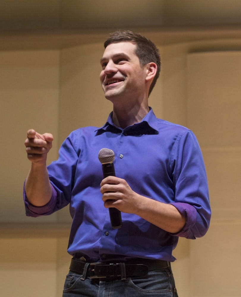 Ryan Penneau looks at the crowd during his Take Back College presentation Monday at Pruis Hall. Penneau