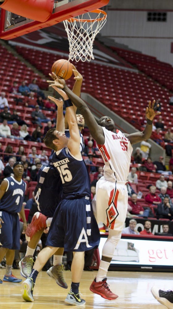 Senior center Majok Majok jumps up for the rebound against Akron on Jan. 8 at Worthen Arena. Majok scored a total of 16 points in this game. DN PHOTO BREANNA DAUGHERTY