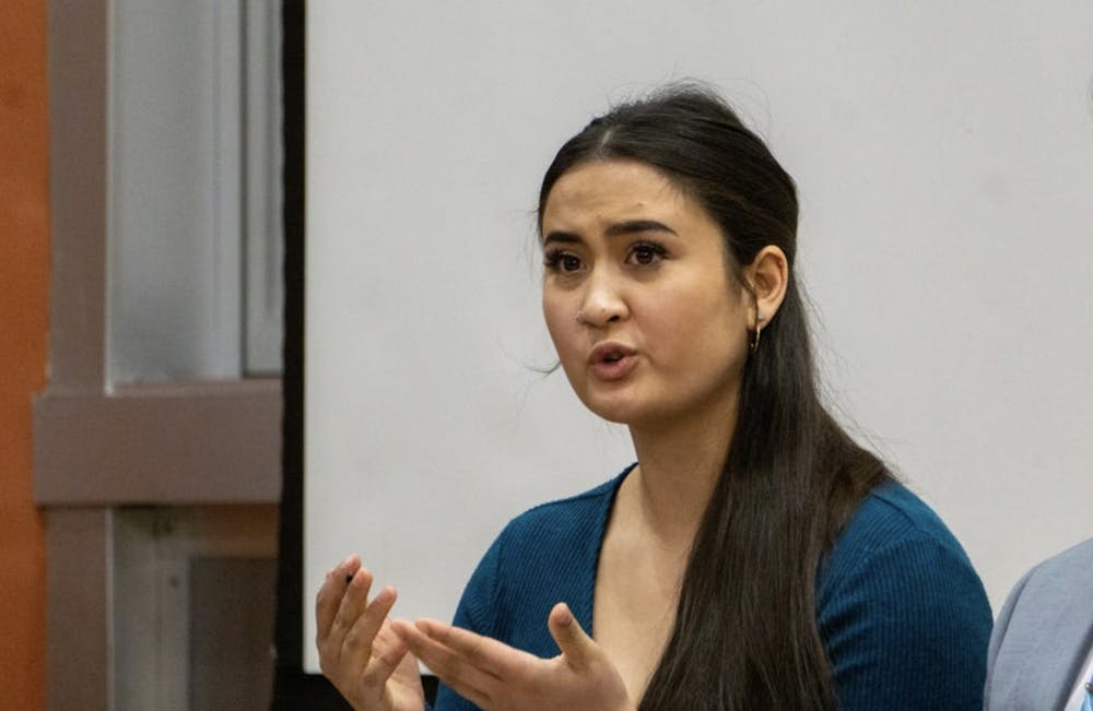 <p>Miryam Bevelle campaigns for SGA president as part of the Aureum slate Feb. 13, 2020. Bevelle co-authored a resolution with Jordyn Blythe that will implement a mandatory implicit bias training for faculty and staff if passed in University Senate.<strong> John Lynch, DN</strong></p>