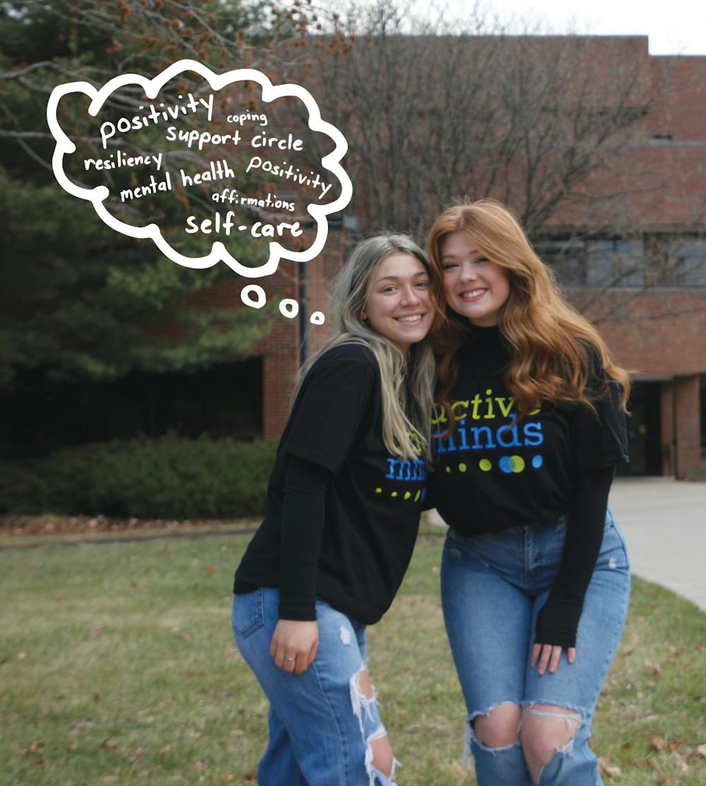 Active Minds Fundraising Chair Megan Anders (left) and Active Minds President Kelsey Dunn (right) pose for a photo Nov. 29 in front of the Whitinger Business Building. Ball State’s chapter is one of 12 in Indiana. Grayson Joslin, DN; Alex Bracken, DN illustration