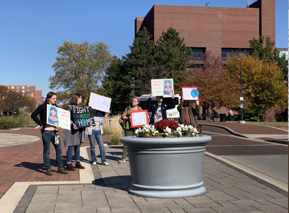On Monday, Oct. 28, students and activists gathered at Shafer Tower with homemade signs as a part of a climate strike. The strike, organized by a student, took place around noon at the tower and later marched up McKinley toward Ball State's quad.