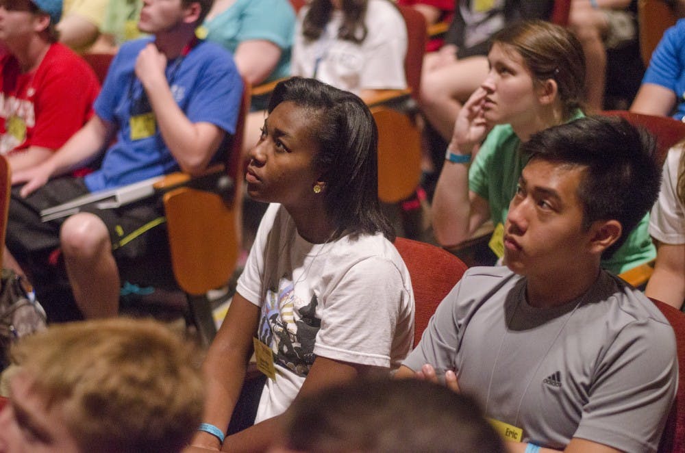 Brianna Miller listens to Fran Kick speak during the opening session of the Music For All leadership weekend June 21 at Sursa Hall. Miller is a drum major from McEachern High School in Georgia. DN PHOTO BREANNA DAUGHERTY