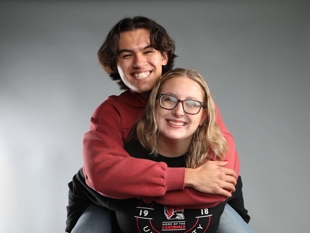 Ball State University graduate Ian McCurdy (left) and Second-year criminal justice major Brynn Hensley (right) pose for a photo Nov. 13, 2023 in the Arts and Journalism building. Hensley suggests keeping an open mind about online dating. Mya Cataline, DN