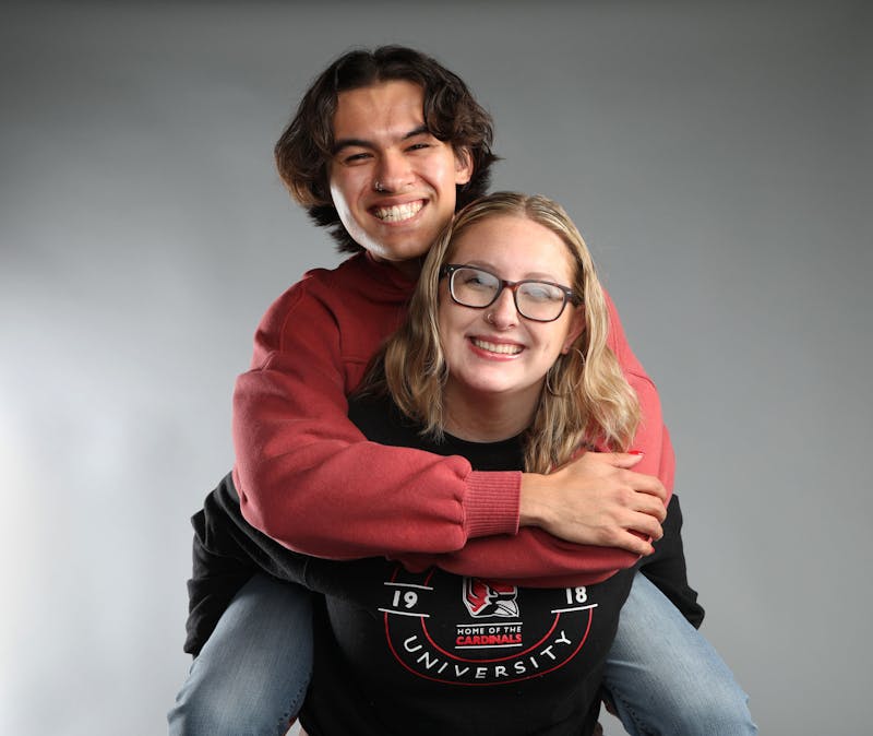 Ball State University graduate Ian McCurdy (left) and Second-year criminal justice major Brynn Hensley (right) pose for a photo Nov. 13, 2023 in the Arts and Journalism building. Hensley suggests keeping an open mind about online dating. Mya Cataline, DN