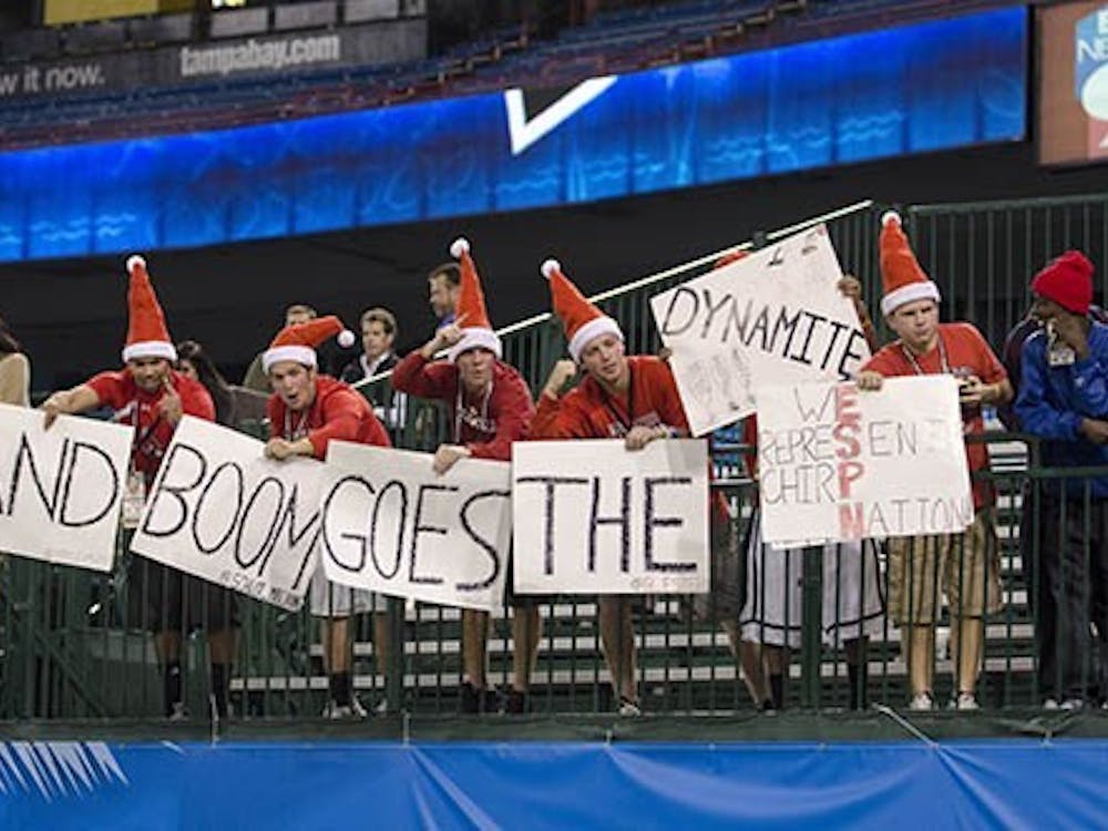 Fans hold signs during the GoDaddy Bowl Jan. 5, 2014 at Ladd-Peebles Stadium in Mobile, Ala. The Cardinals lost to the Arkansas State Red Wolves 23-23. Corey Ohlenkamp, DN File
