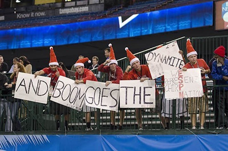 Fans hold signs during the GoDaddy Bowl Jan. 5, 2014 at Ladd-Peebles Stadium in Mobile, Ala. The Cardinals lost to the Arkansas State Red Wolves 23-23. Corey Ohlenkamp, DN File