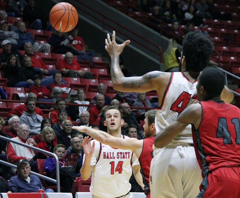 Forward Kyle Mallers passes the ball to center Trey Moses during the Cardinals’ game against IU Kokomo on Nov. 29, 2016 in John E. Worthen Arena. Ball State won 92 to 52. Paige Grider, DN File