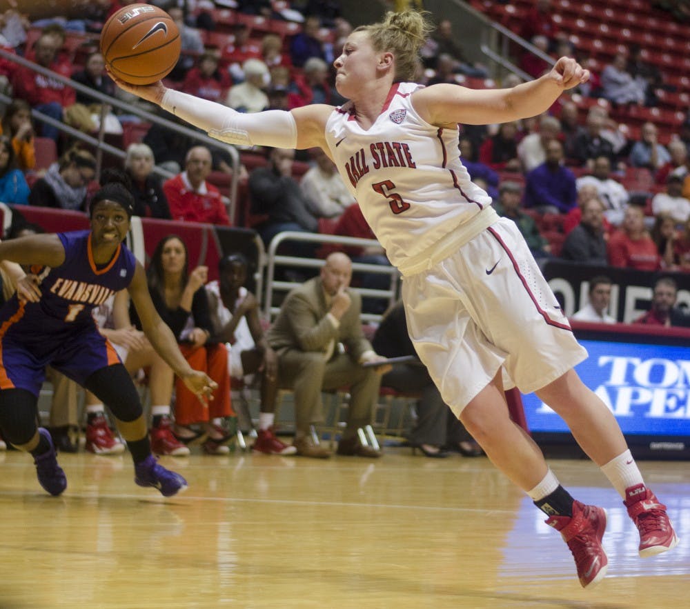 Sophomore guard Jill Morrison reaches for a rebound during the game against Evansville on Nov. 19 at Worthen Arena. DN PHOTO BREANNA DAUGHERTY