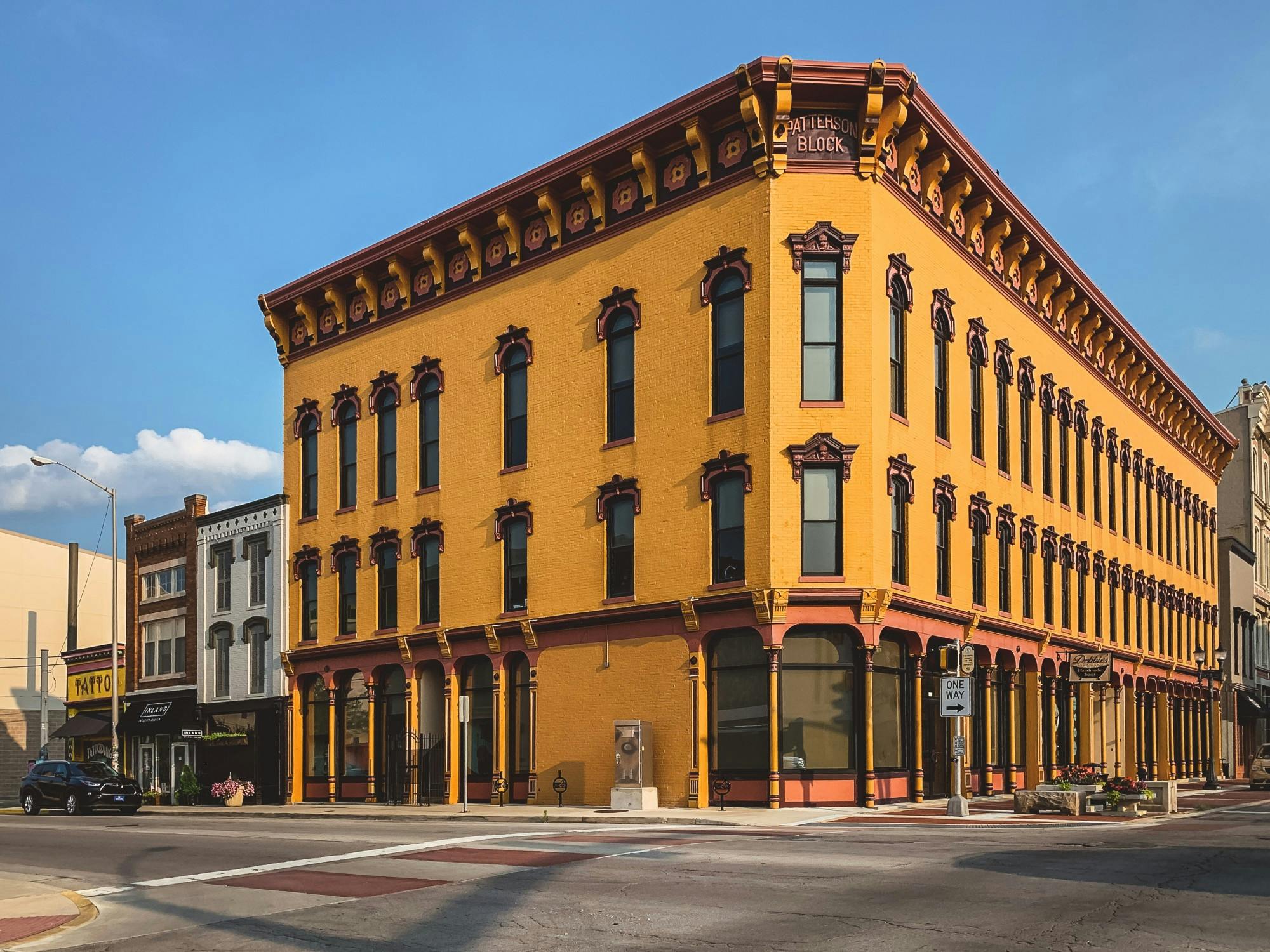 The Patterson Block sits at the corner of Main and Walnut streets in downtown Muncie. Pink Leaf: A Learning Company bought the building in 2021 and it will host a grand opening Aug. 5. Matt Howell, Pink Leaf Learning, Photo Provided