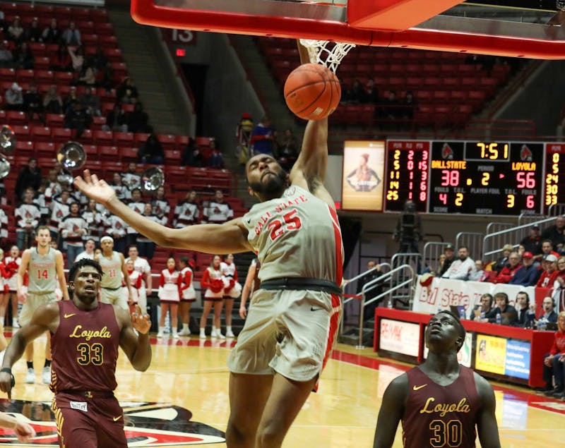 Senior Forward, Tahjai Teague (25), punishes the rim against Loyola Chicago Dec 3, 2019 at John E. Worthen Arena. Teague had 14 points in a 70-58 loss. Omari Smith, DN