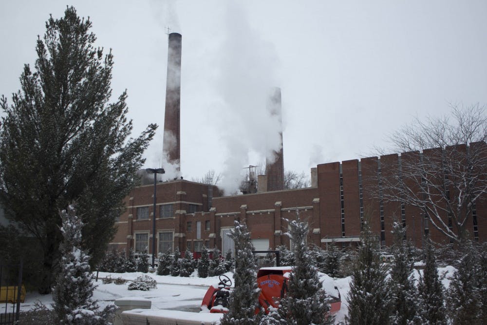Smoke billows from the coal plant on Ball State