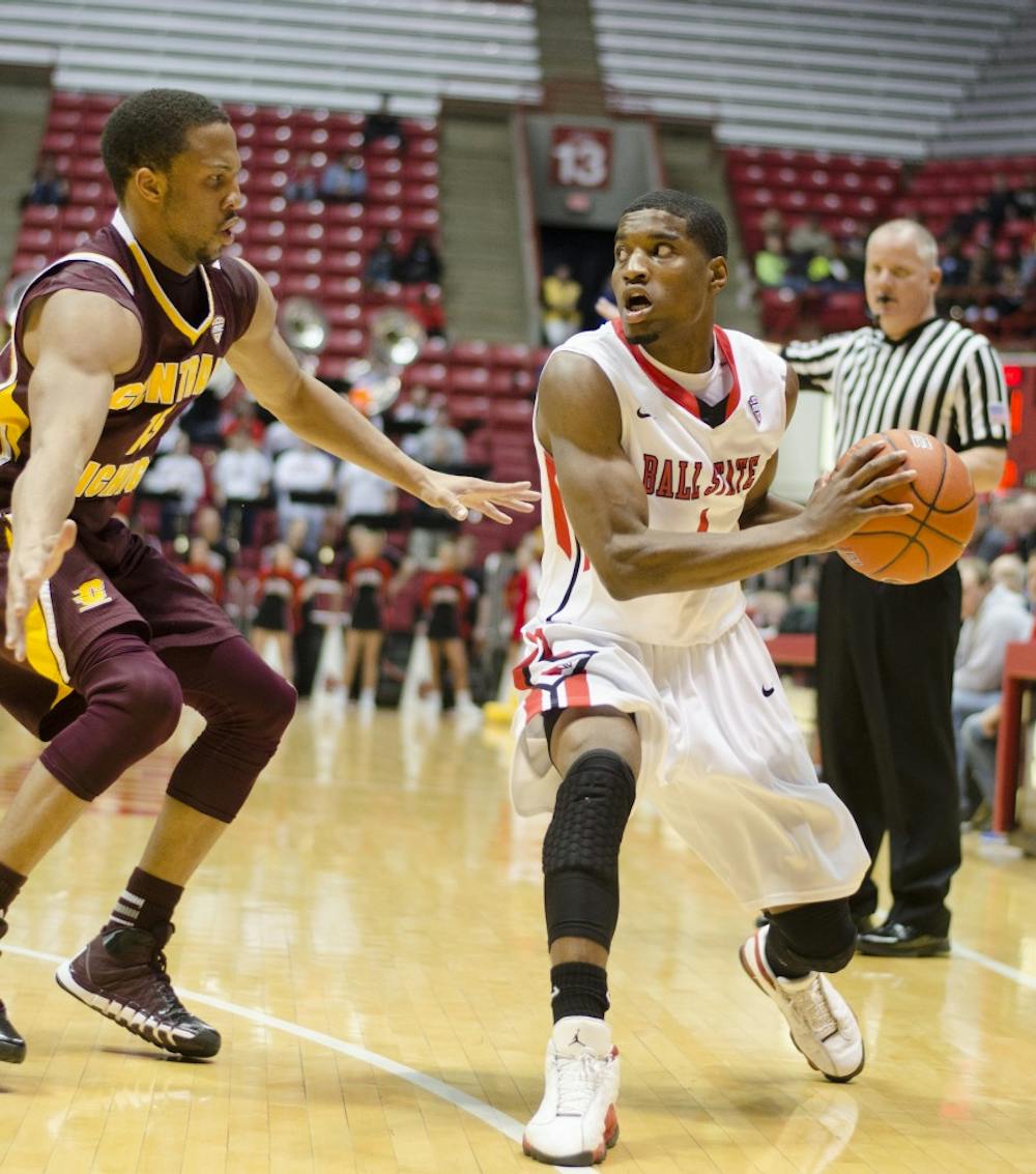 Senior guard Kindon Crowder keeps the ball away from a Central Michigan player in the second half on March 1 at Worthen Arena. DN PHOTO BREANNA DAUGHERTY 
