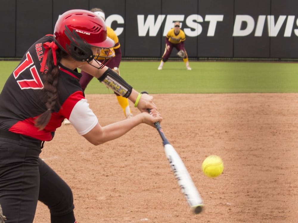 Ball State senior Brittany Hopper hits the ball during the first game against Central Michigan April 21 at the softball field at First Merchant’s Ballpark Complex. Briana Hale, DN