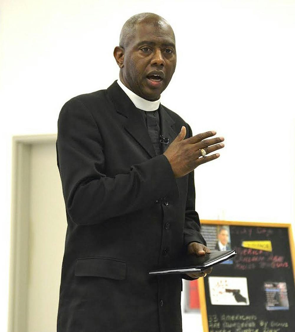 <p>The Muncie Unity Center's Gun Violence Prevention Team had an event on April 21 where they brought in Indianapolis Rev. Charles Harrison. Harrison spoke about the community and ways to curb gun violence involving youth. The Unity Center will be hosting its first gun violence prevention rally on April 22 from 4-7 p.m. at the Canan Commons located on S. Walnut St. in downtown Muncie.&nbsp;<em>DN PHOTO ALLIE KIRKMAN</em></p>