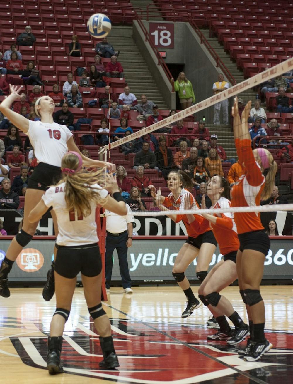 Sophomore middle hitter Hayley Benson goes up for a spike against Bowling Green State University on Oct. 25 at Worthen Arena. Benson finished with nine kills during the match. DN PHOTO MATT McKINNEY