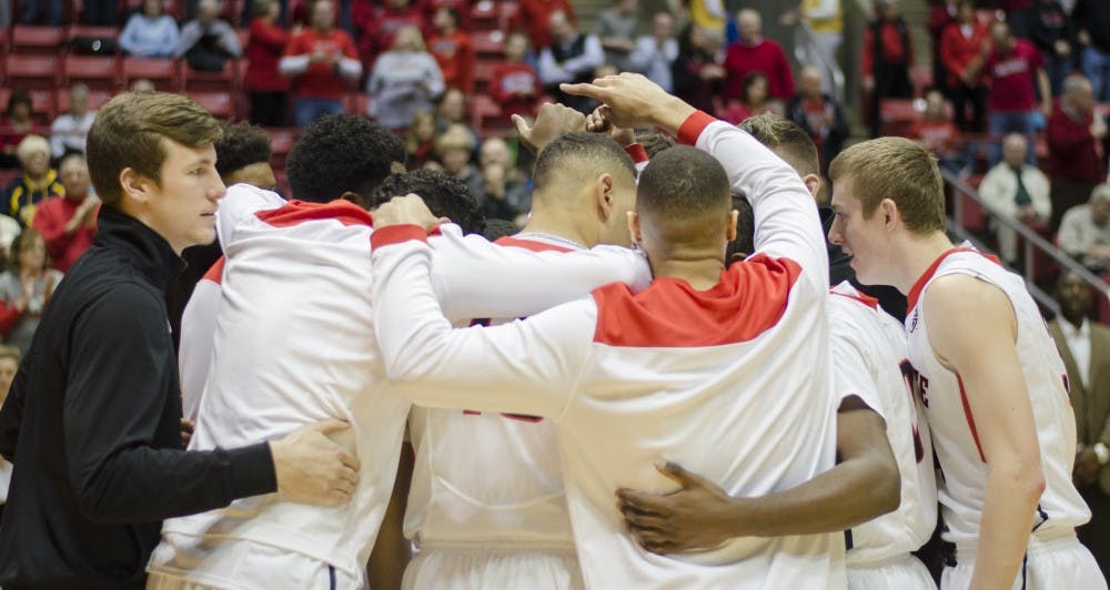 The men's basketball team huddles up before the game against Kent State on Jan. 24 at Worthen Arena. DN PHOTO BREANNA DAUGHERTY