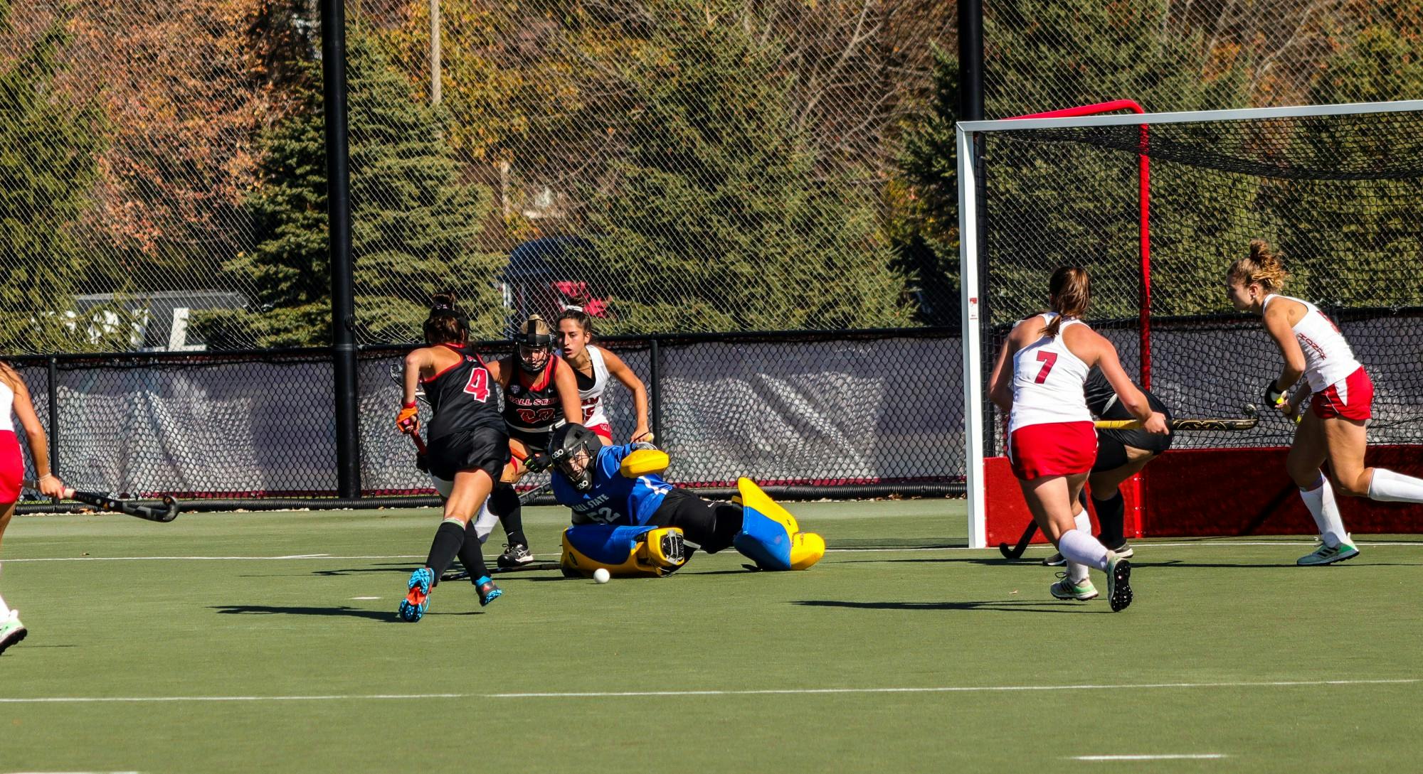 Third-year goalkeeper Hannah Johnston saves the puck from going in the 
goal during the  second half of the game against Miami Ohio on Oct. 28 at Briner Sports Complex.  Eve Green, DN