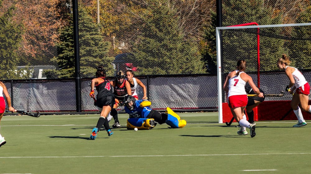 Third-year goalkeeper Hannah Johnston saves the puck from going in the 
goal during the  second half of the game against Miami Ohio on Oct. 28 at Briner Sports Complex.  Eve Green, DN