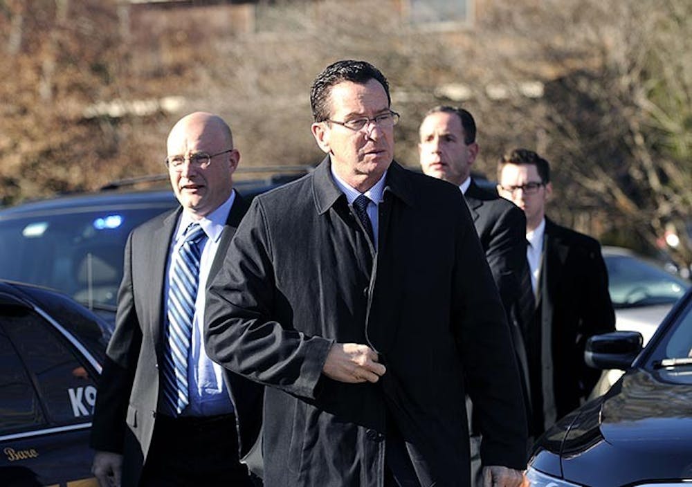 Gov. Dannel Malloy arrives at Sandy Hook Elementary School in Newtown, Connecticut, Friday, December 14, 2012. Twenty-seven people, including 18 children, have been killed in a shooting at Sandy Hook Elementary School in Newtown, Connecticut. (Cloe Poisson/Hartford Courant/MCT)