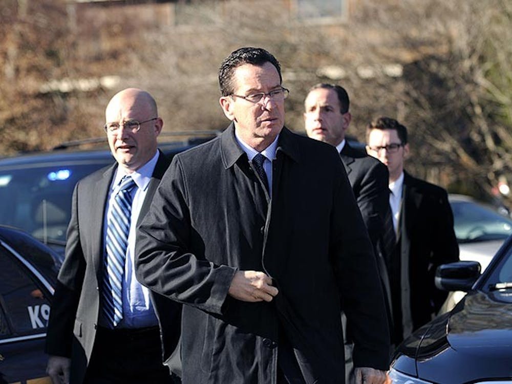Gov. Dannel Malloy arrives at Sandy Hook Elementary School in Newtown, Connecticut, Friday, December 14, 2012. Twenty-seven people, including 18 children, have been killed in a shooting at Sandy Hook Elementary School in Newtown, Connecticut. (Cloe Poisson/Hartford Courant/MCT)