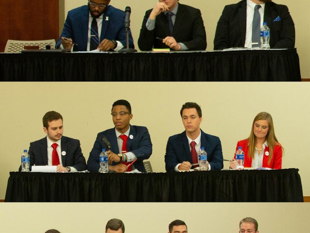 (Top to bottom) United slate candidates, Empower slate candidates and Elevate slate candidates sit during the All-Slate Debate in the L.A. Pittenger Student Center ballroom Feb. 18, 2019. Slates debated on a variety of topics. Scott Fleener, DN