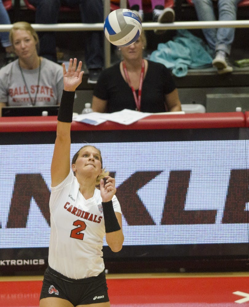 Fifth year senior outside hitter Alex Fuelling attempts to hit the ball over the net in the second game of the Active Ankle Tournament against Belmont on Aug. 28 at Worthen Arena. DN PHOTO BREANNA DAUGHERTY