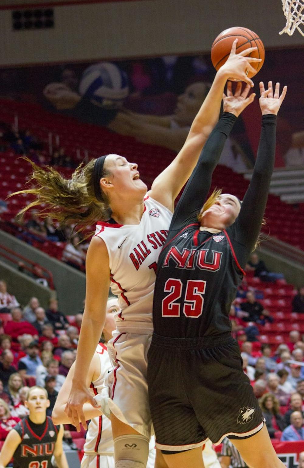 Senior Renee Bennett uses her height to steal a rebound from an opponent during the January 28th game against Northern Illinois at Worthern Arena.