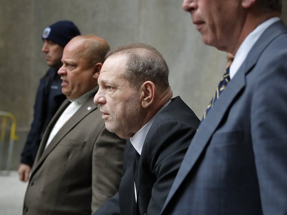 Harvey Weinstein, third from left, leaves court in New York, Monday, Jan. 6, 2020. The disgraced movie mogul faced allegations of rape and sexual assault. (AP Photo/Seth Wenig)