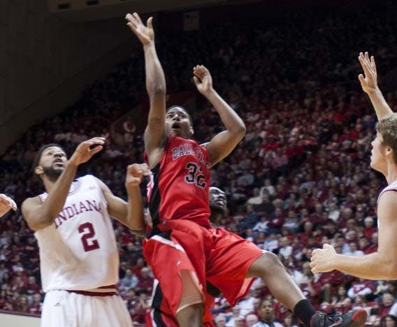 Junior guard Jesse Berry attempts to make a jump shot during the game against Indiana on Sunday Nov. 25, 2012. Berry has seen an increase in unforced turnovers this season, said head coach Billy Taylor. DN PHOTO BOBBY ELLIS