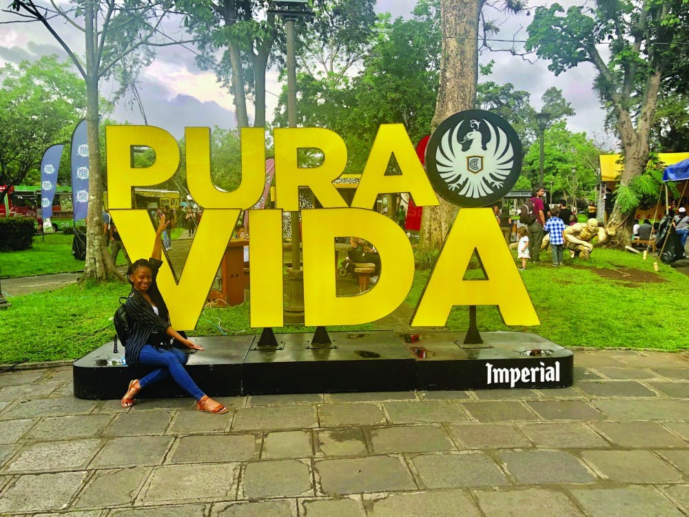 <p>Senior exercise science major Edlecia Ward found several "Pura Vida" signs while she was studying abroad in San Jose, Costa Rica in summer 2019. Translating to "pure life," Ward said the phrase "pura vida" had such an impact on her that she tattooed the phrase onto her calf. <strong>Edlecia Ward, Photo Provided.&nbsp;</strong></p>
