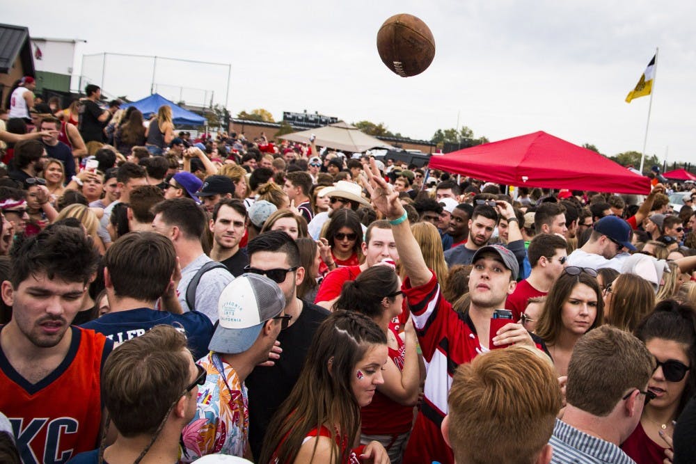 Ball State students, parents and alumni kicked off the Homecoming game with tailgating festivities Oct. 21, 2017, in the Scheumann Stadium student overflew parking lot. The Homecoming celebrations start early Saturday morning with the Homecoming parade and the 5k before Cardinal’s football game against Central Michigan. Grace Hollars, DN