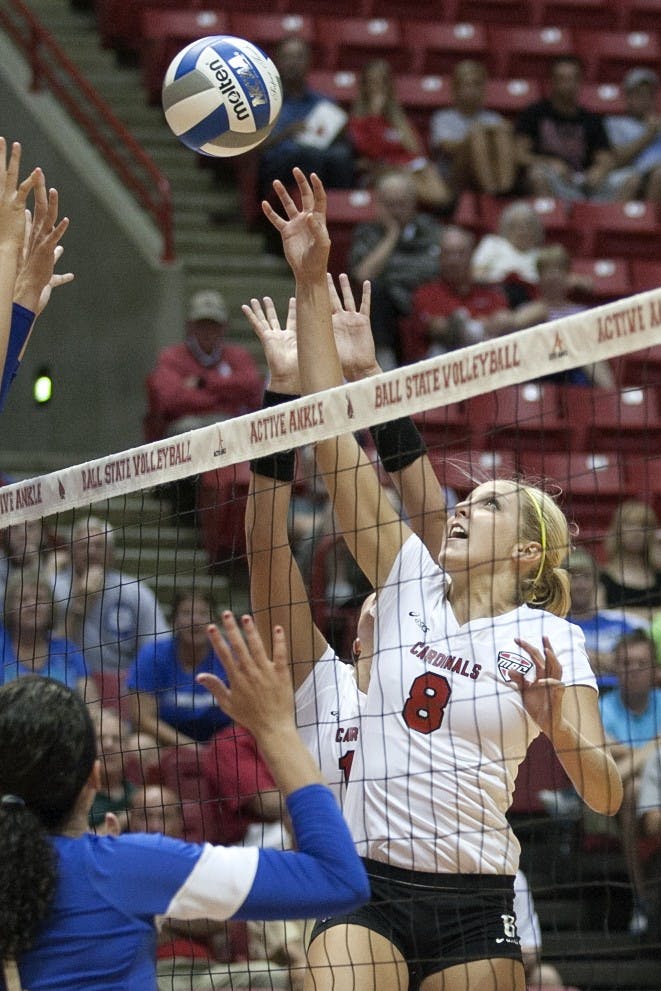 Mindy Marx, a junior middle blocker, plays during the fifth set against IPFW. After the fall season, Marx switched to the field and track team. DN FILE PHOTO JORDAN HUFFER