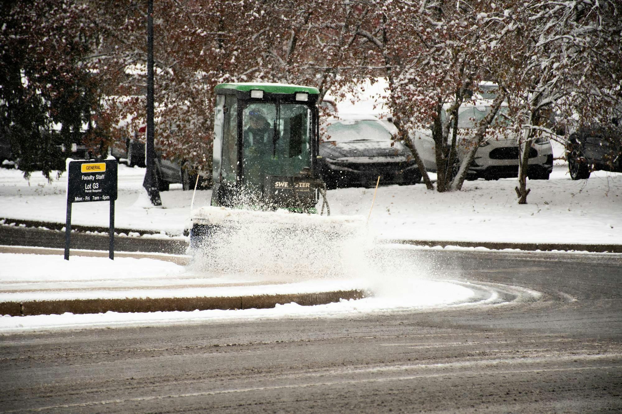 Snow plow clears sidewalks so students can walk safely Nov. 10 outside of the Recreational Center in Muncie, Ind. Kadin Bright, DN