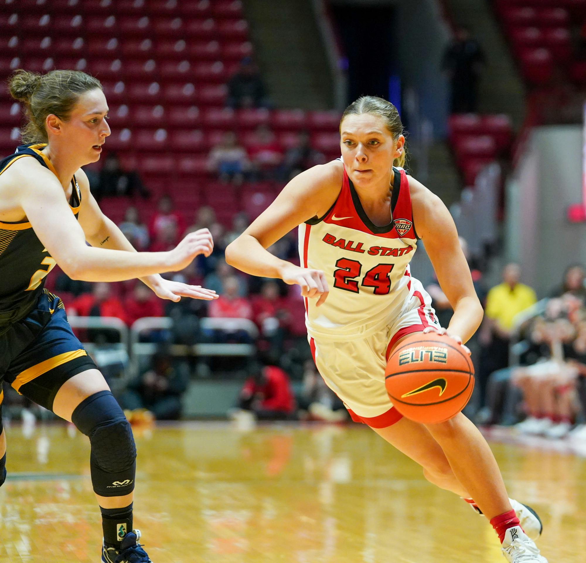 Sophomore Madelyn Bischoff drives to the whole in a game against Toledo Feb. 25 at Worthen Arena. Bischoff tallied four rebounds in the game against the Rockets. Brayden Goins, DN