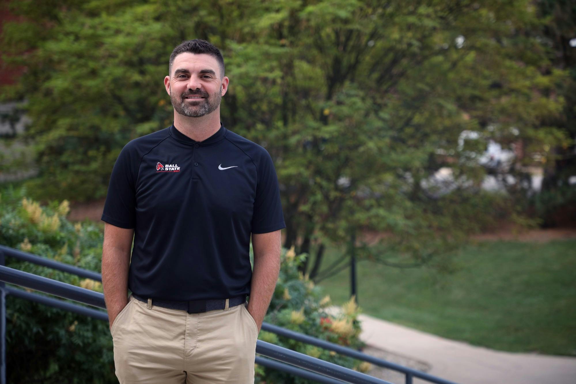 Women’s Golf Head Coach Cam Andry poses for a portrait outside of Worthen Arena Sept. 6. Amber Pietz, DN