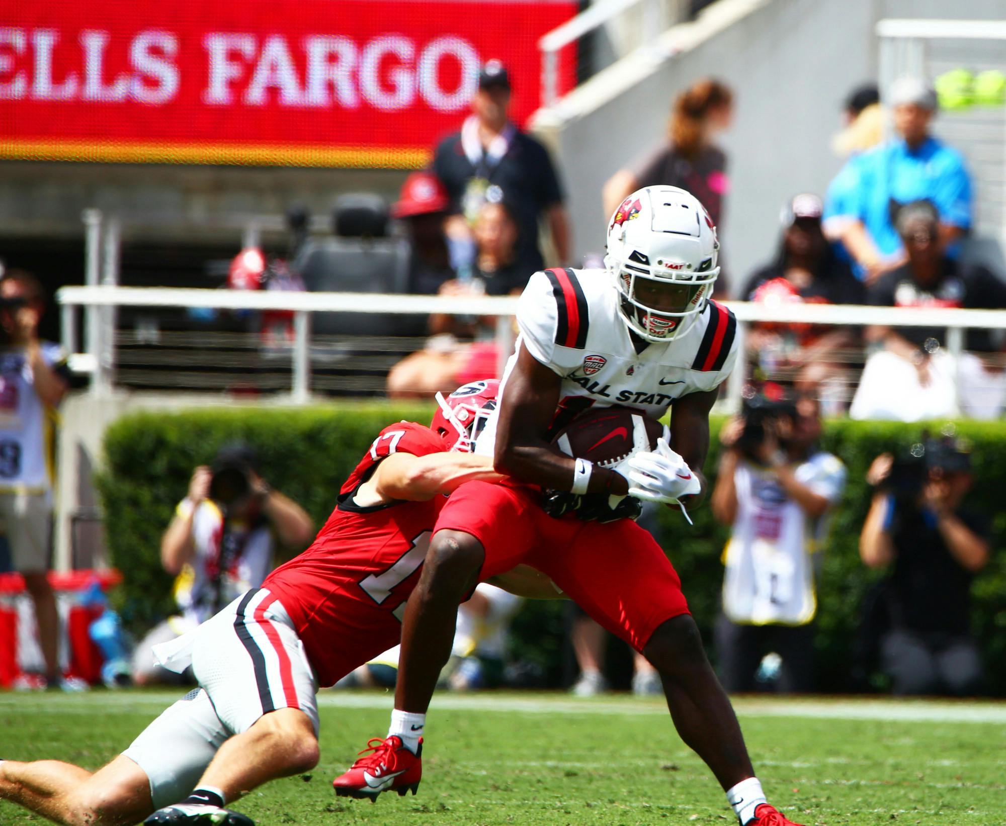 Redshirt sophomore wide receiver Qian Magwood gets tackled against Georgia Sept. 9 at Sanford Stadium in Athens, Ga. Magwood received a total of 12 yards in the game. Mya Cataline, DN